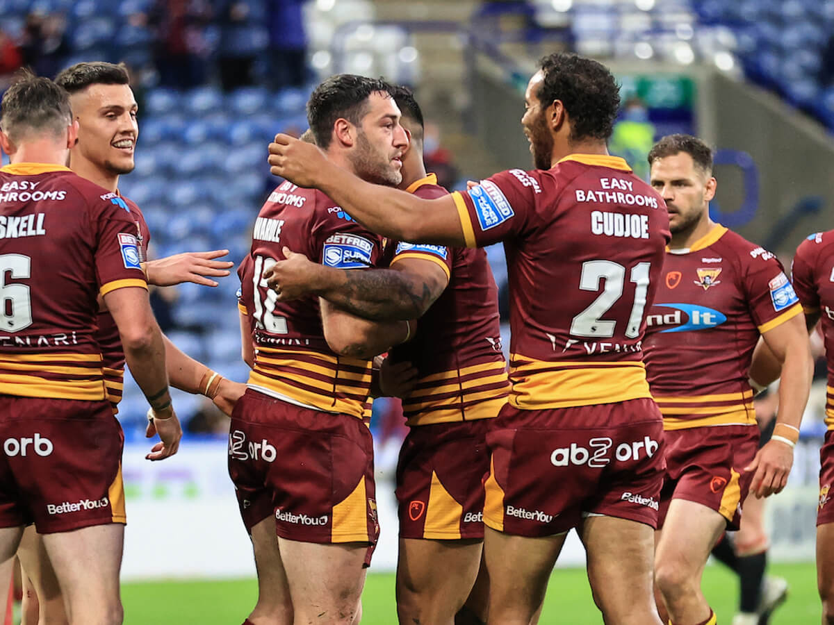Huddersfield celebrate a try
