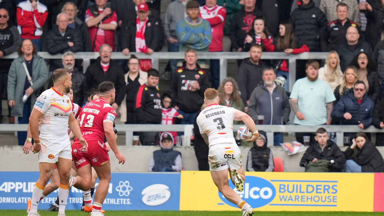 Adam Keighran scores against Salford Red Devils. Photo by Steve Flynn/News Images.