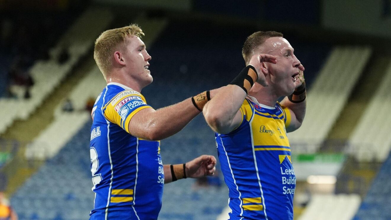 Harry Newman and James McDonnell celebrating a try v Huddersfield Giants