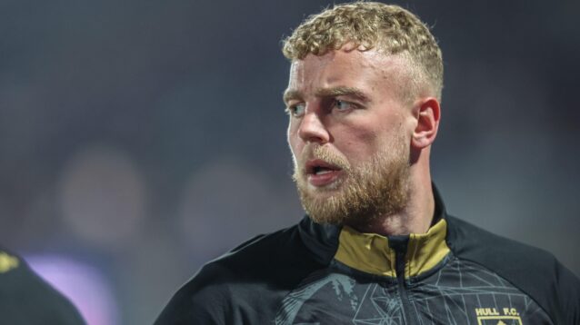 Jack Ashworth warms up ahead of a Hull FC game in 2025