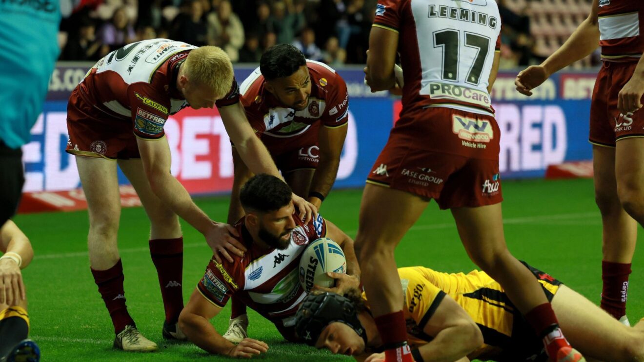 Abbas Miski scores a try for Wigan Warriors in 2025