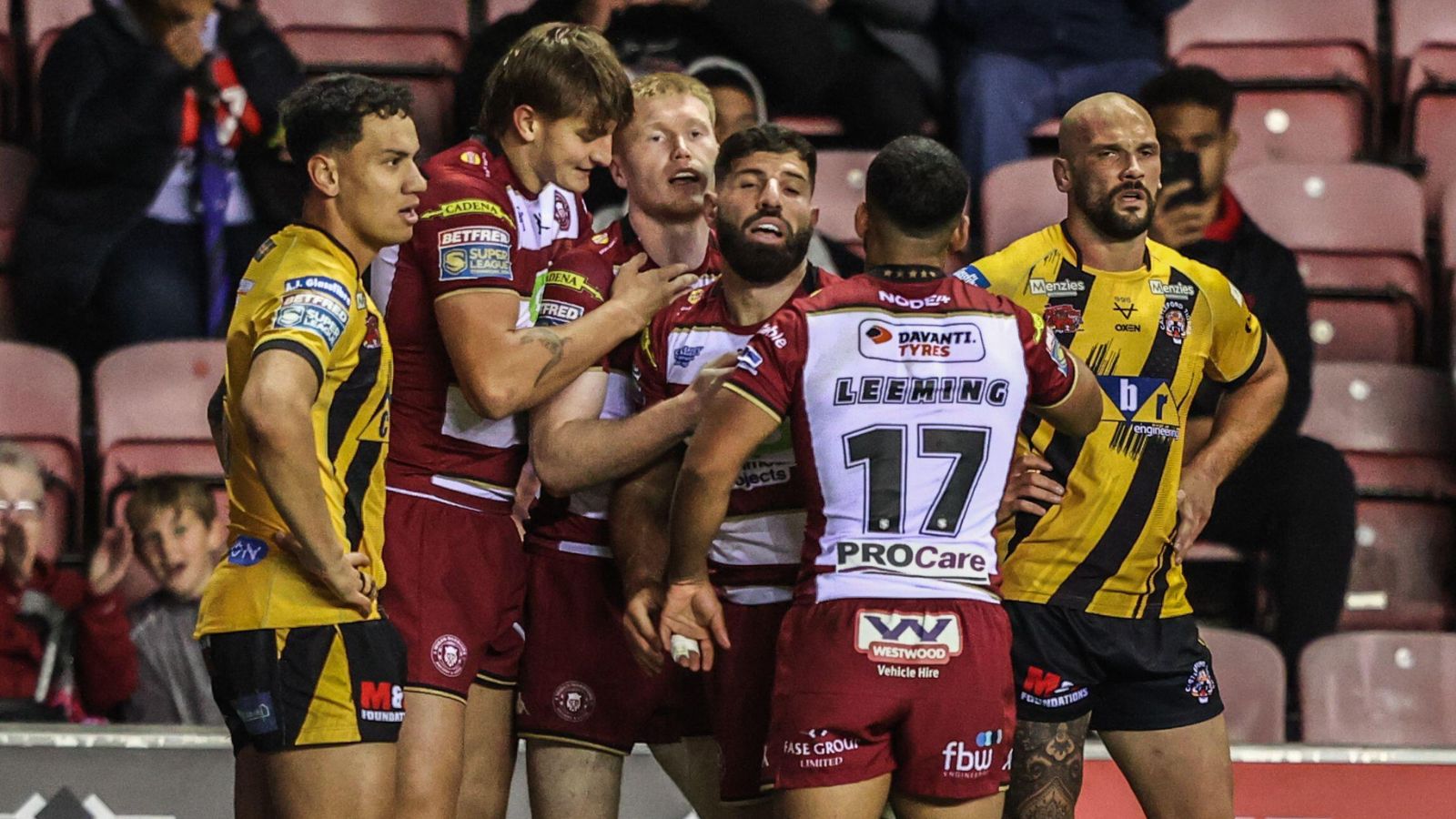 Wigan Warriors celebrate a try at home against Castleford Tigers in 2025