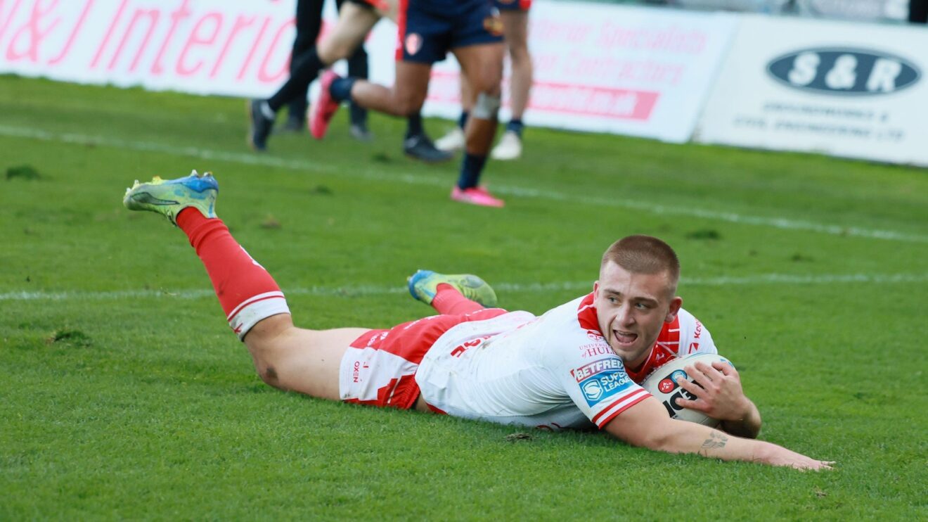 Mikey Lewis slides in to score a try Hull KR in their Super League play-off semi-final win over St Helens in 2025