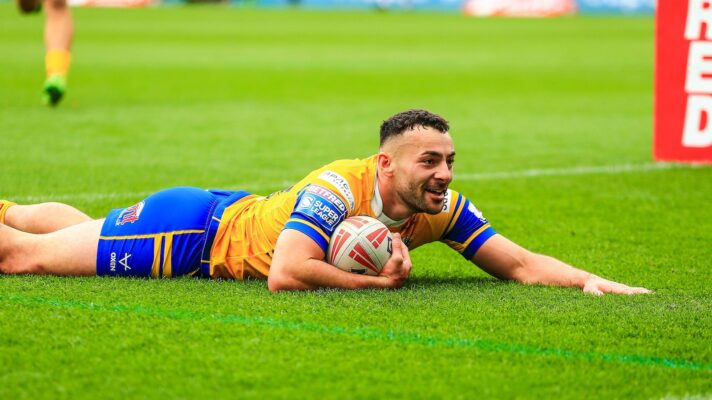 Jake Connor slides in to score a try for Leeds Rhinos in 2025