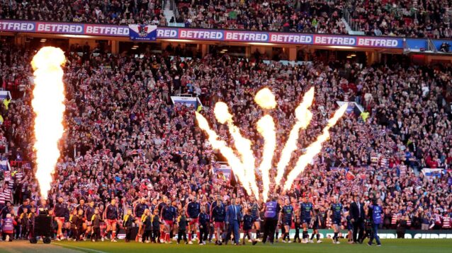 Hull KR and Wigan Warriors walk out at Old Trafford ahead of the 2025 Super League Grand Final