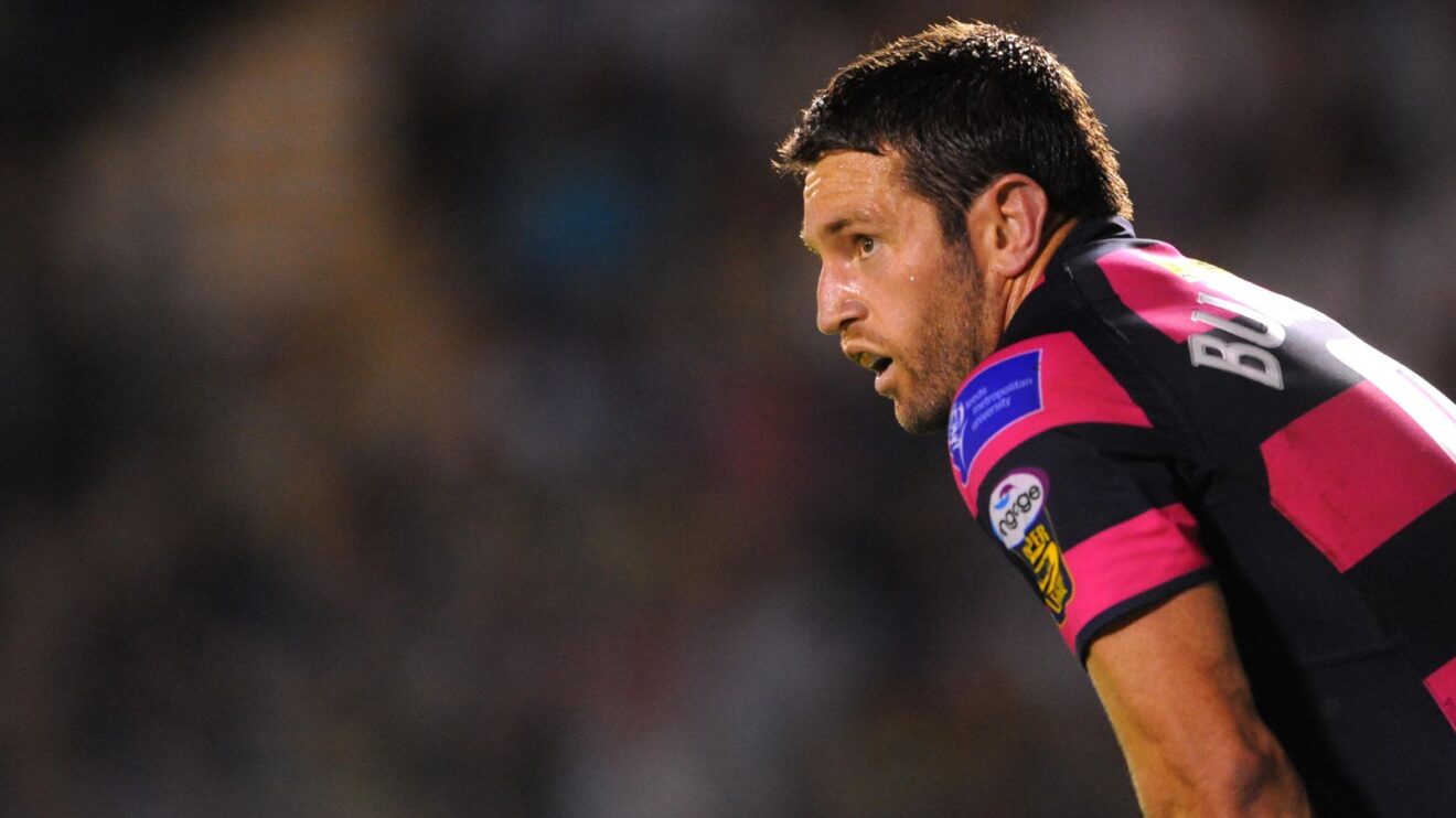 Danny Buderus in action for Leeds Rhinos in 2011, hunched over during a game