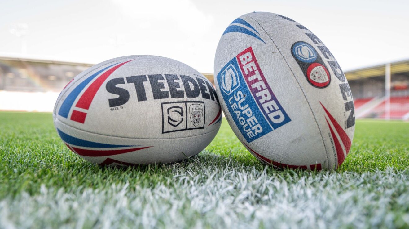 Two Super League match balls pictured on the pitch prior to a game