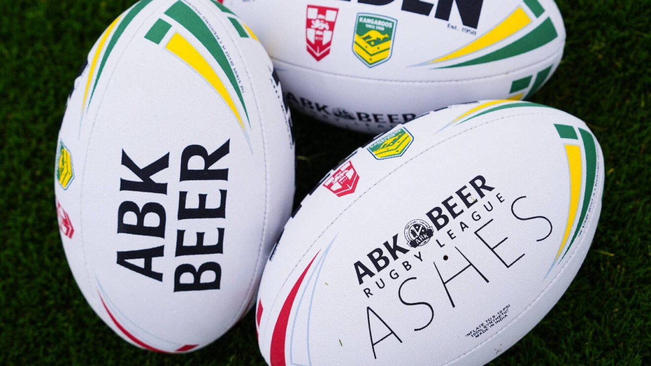 Three 2025 Ashes match balls pictured on a pitch