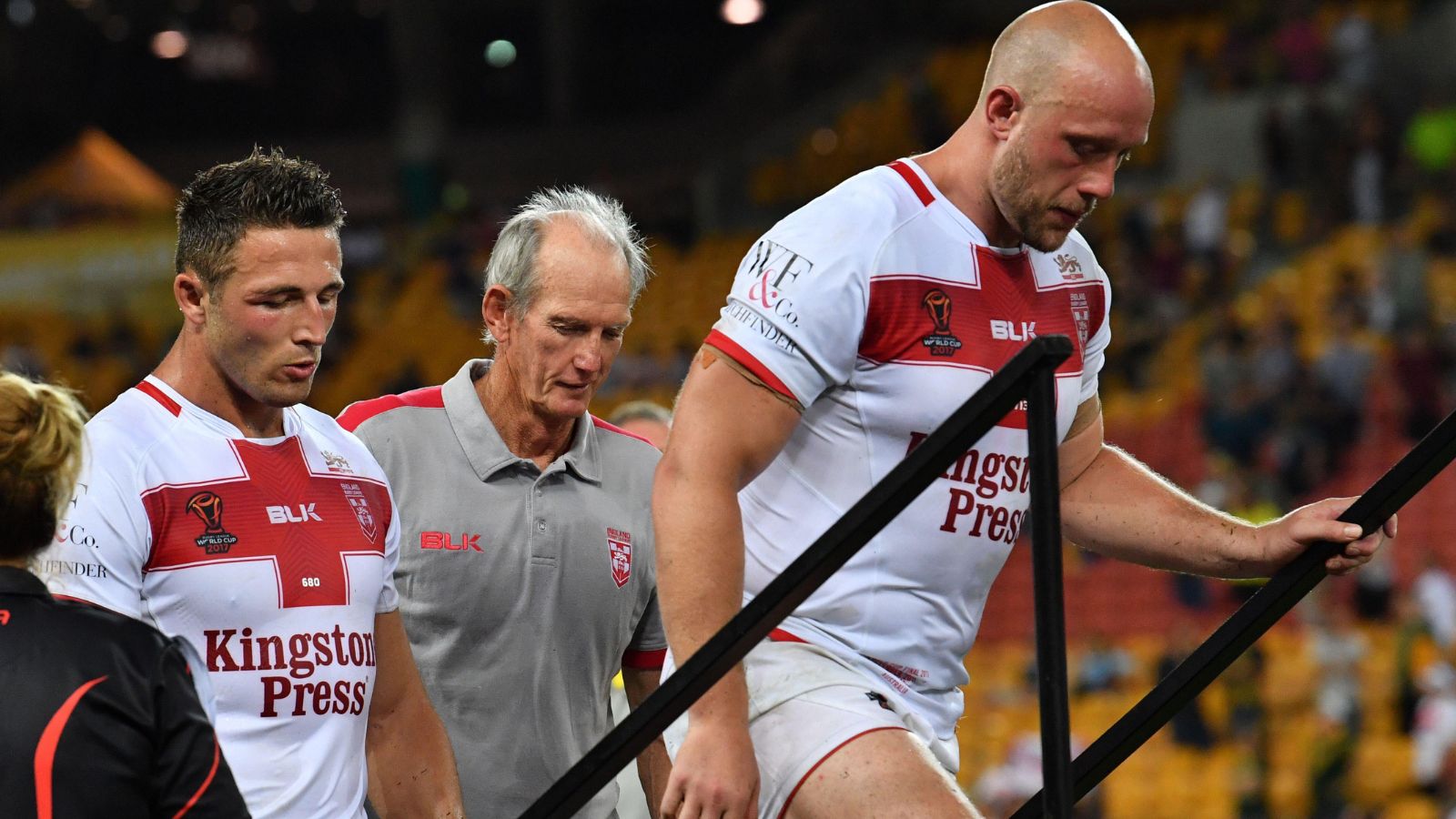 Sam Burgess, head coach Wayne Bennett and Chris Hill dejected following England's defeat to Australia in the 2017 Rugby League World Cup