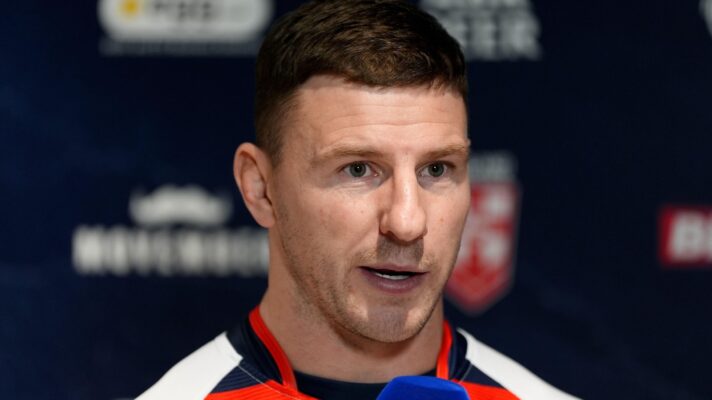 England captain George Williams speaks to the media