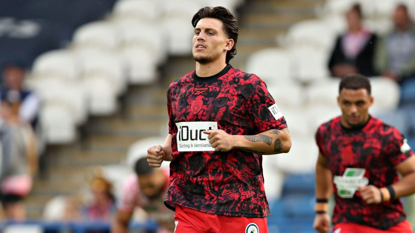 Owen Trout warms up ahead of a Leigh Leopards game in 2025