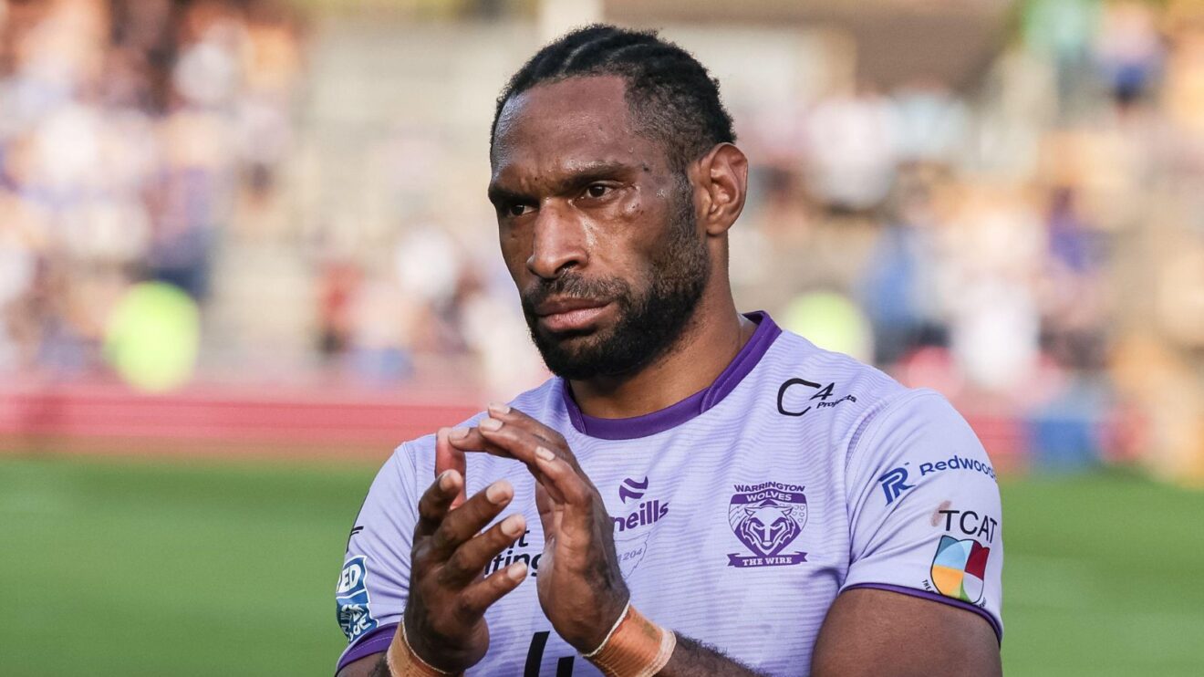 Rodrick Tai applauds the Warrington Wolves supporters following a game in 2025
