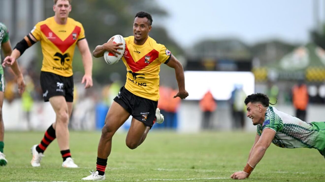 Morea Morea in action for Papua New Guinea in 2024, carrying the ball during a game against the Cook Islands