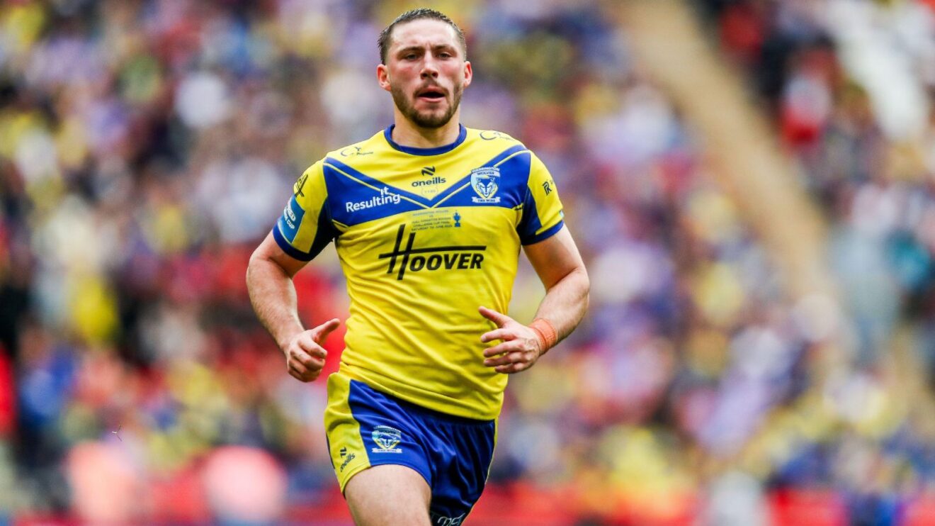 Adam Holroyd in action for Warrington Wolves in 2025