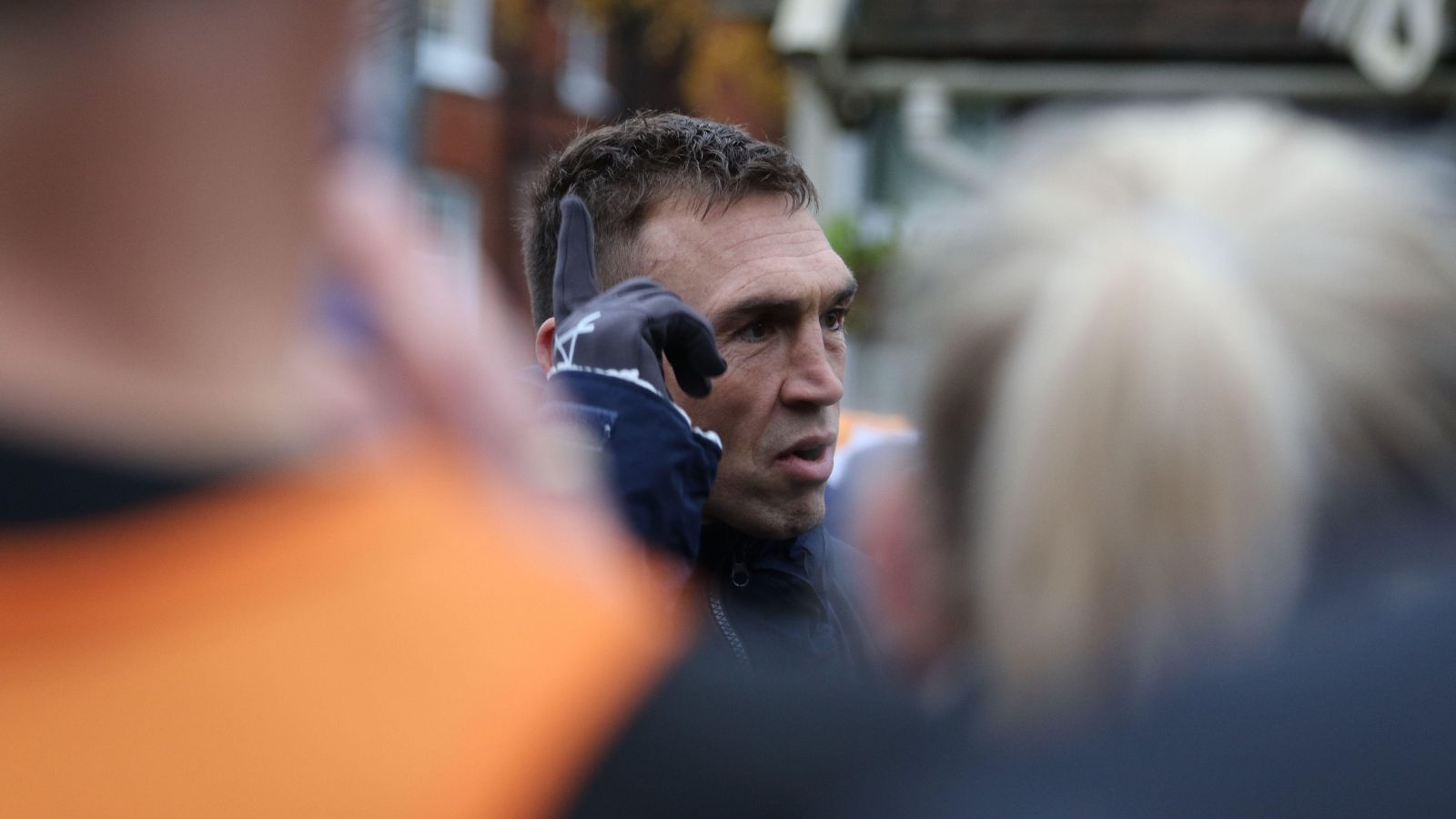 Kevin Sinfield talks to members of the MND community in Christchurch Park in Ipswich during day one of his '7 in 7: Together' challenge in 2025