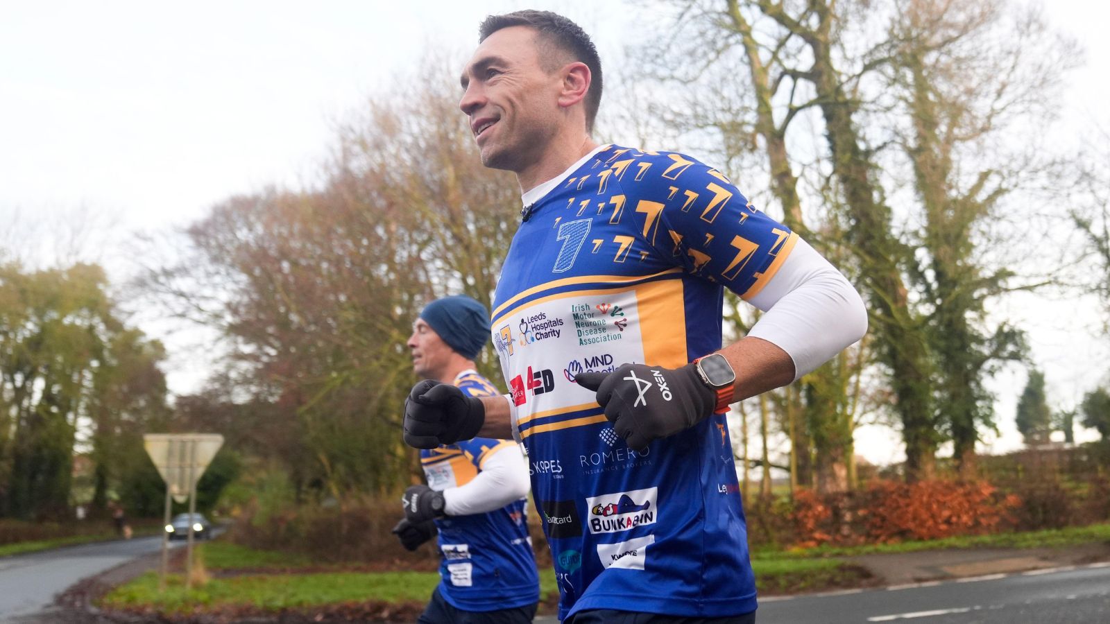Kevin Sinfield all smiles as he runs near Green Hammerton on the final day of his '7 in 7: Together' challenge in 2025
