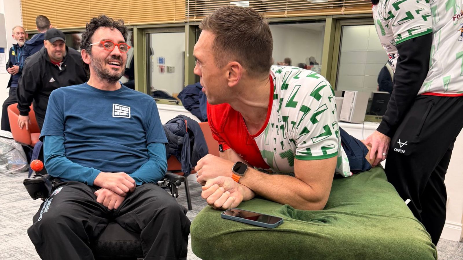 Kevin Sinfield speaks to Andrés Estevez-Guersanik from Dublin as he receives physio treatment during day two of his '7 in 7: Together' challenge in 2025