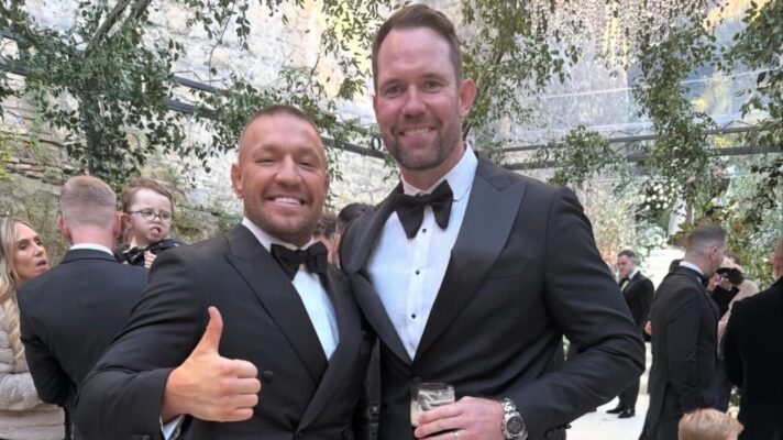 Pat Richards poses for a picture alongside Conor McGregor during the MMA star's wedding in Rome