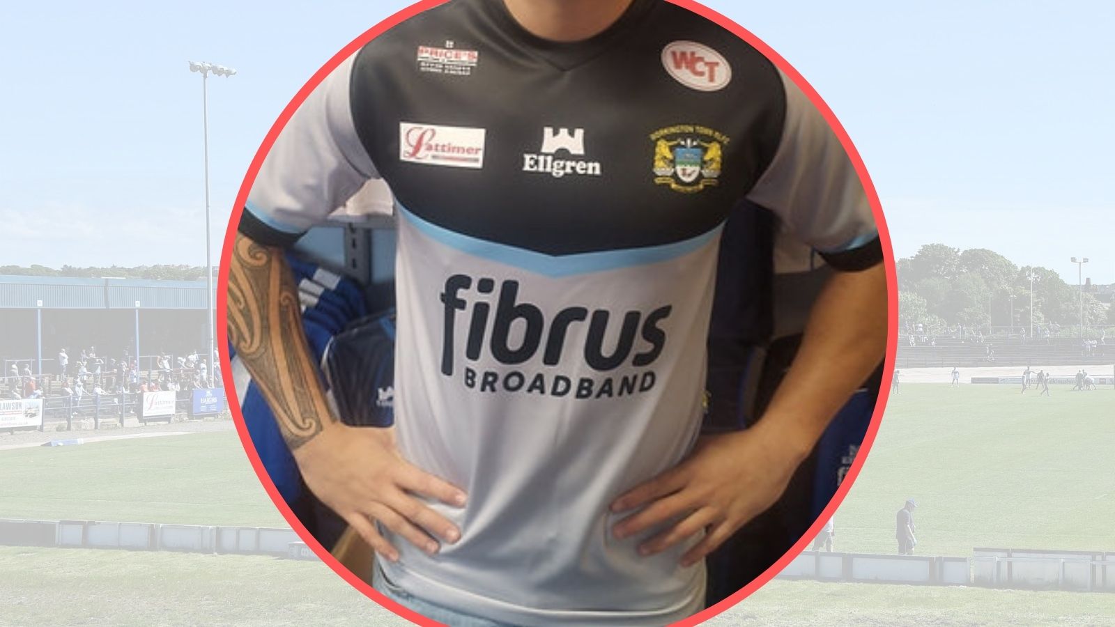 A close-up image of Workington Town's away shirt for 2026 overlayed in a circle over a picture of Derwent Park