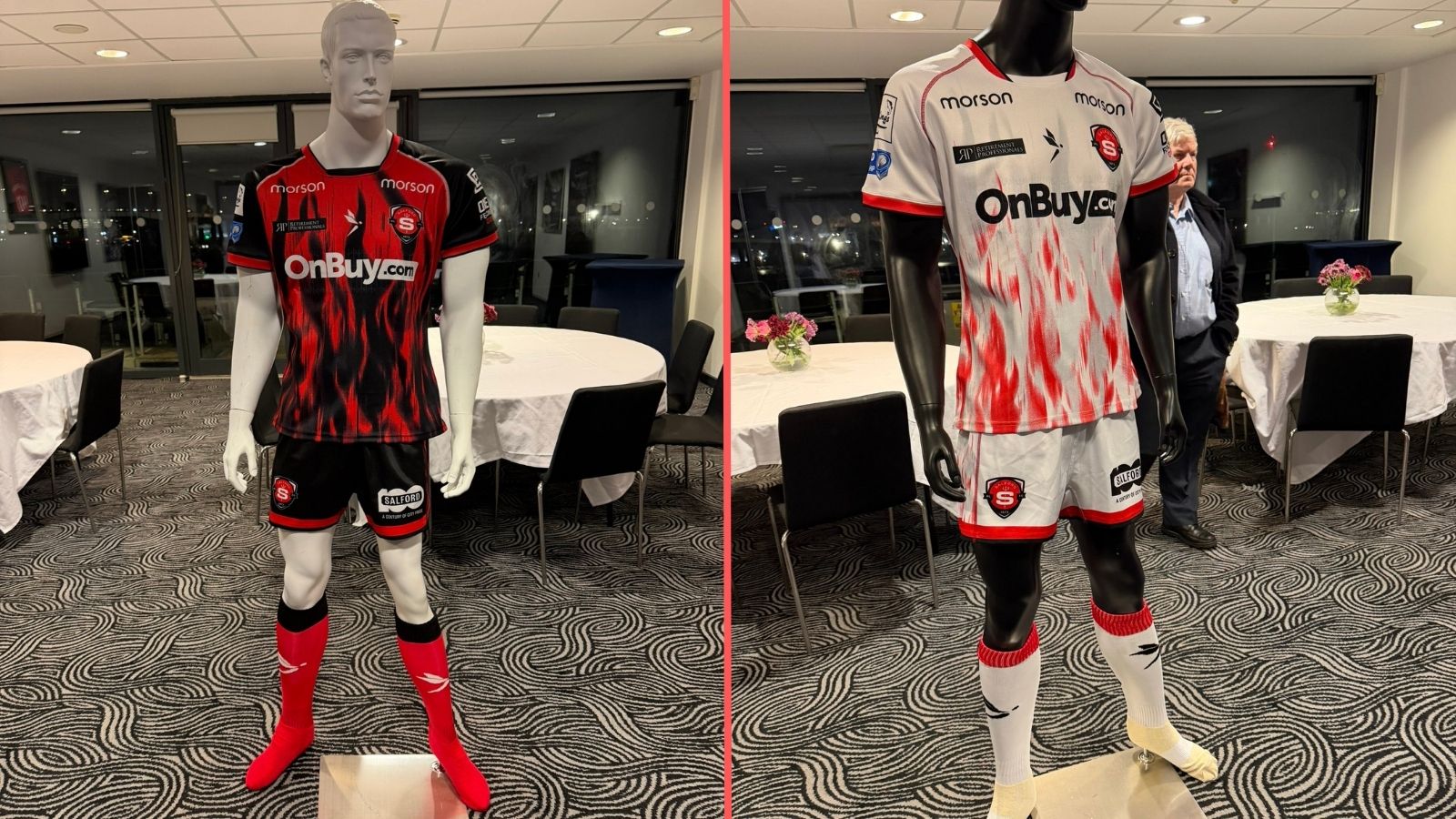 Salford RLFC's home and away kits for 2026, shown on mannequins in a hospitality suite at the CorpArq Stadium