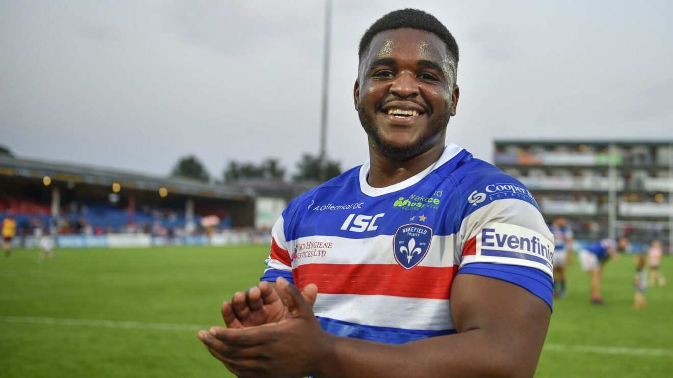 Titus Gwaze applauds the Wakefield Trinity supporters at Belle Vue following a game in 2019