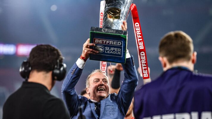 Hull KR owner Neil Hudgell holds aloft the Super League trophy following their Grand Final triumph in 2026