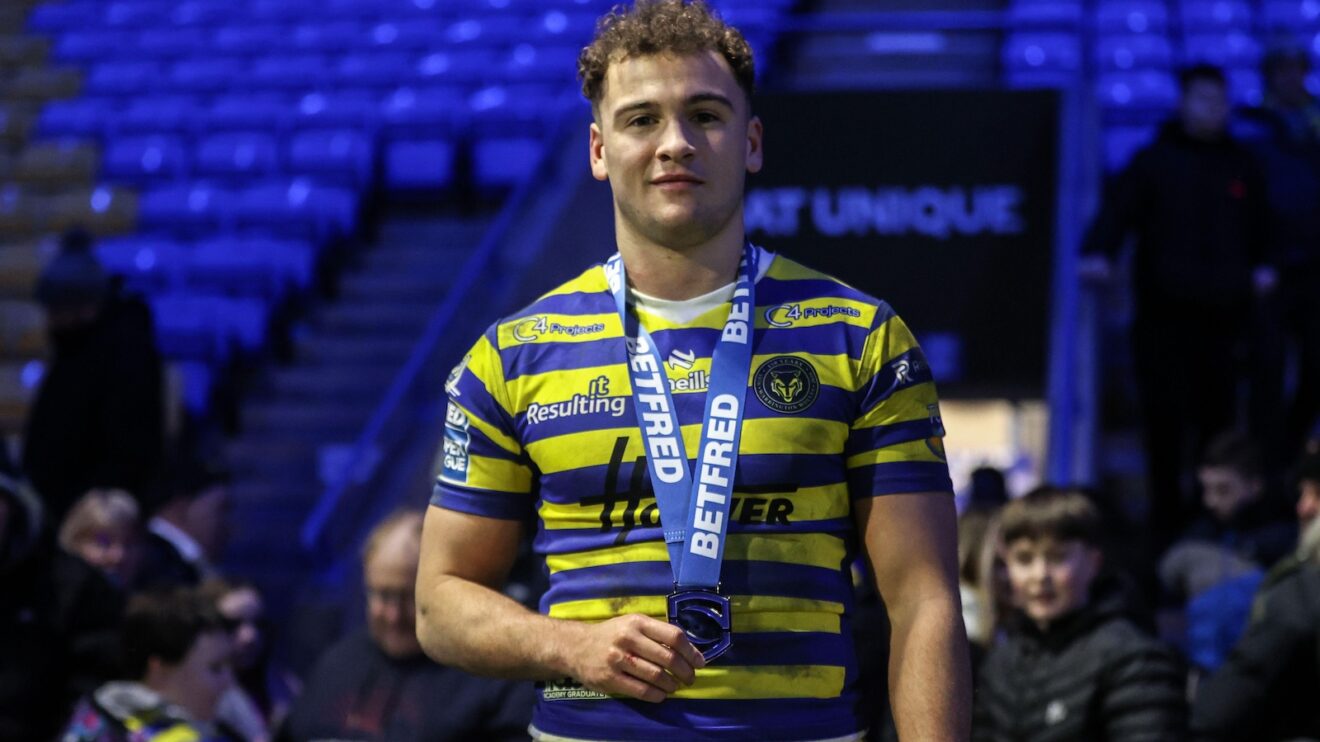 Warrington Wolves full-back Cai Taylor-Wray poses with a Player of the Match medal following a game in 2026