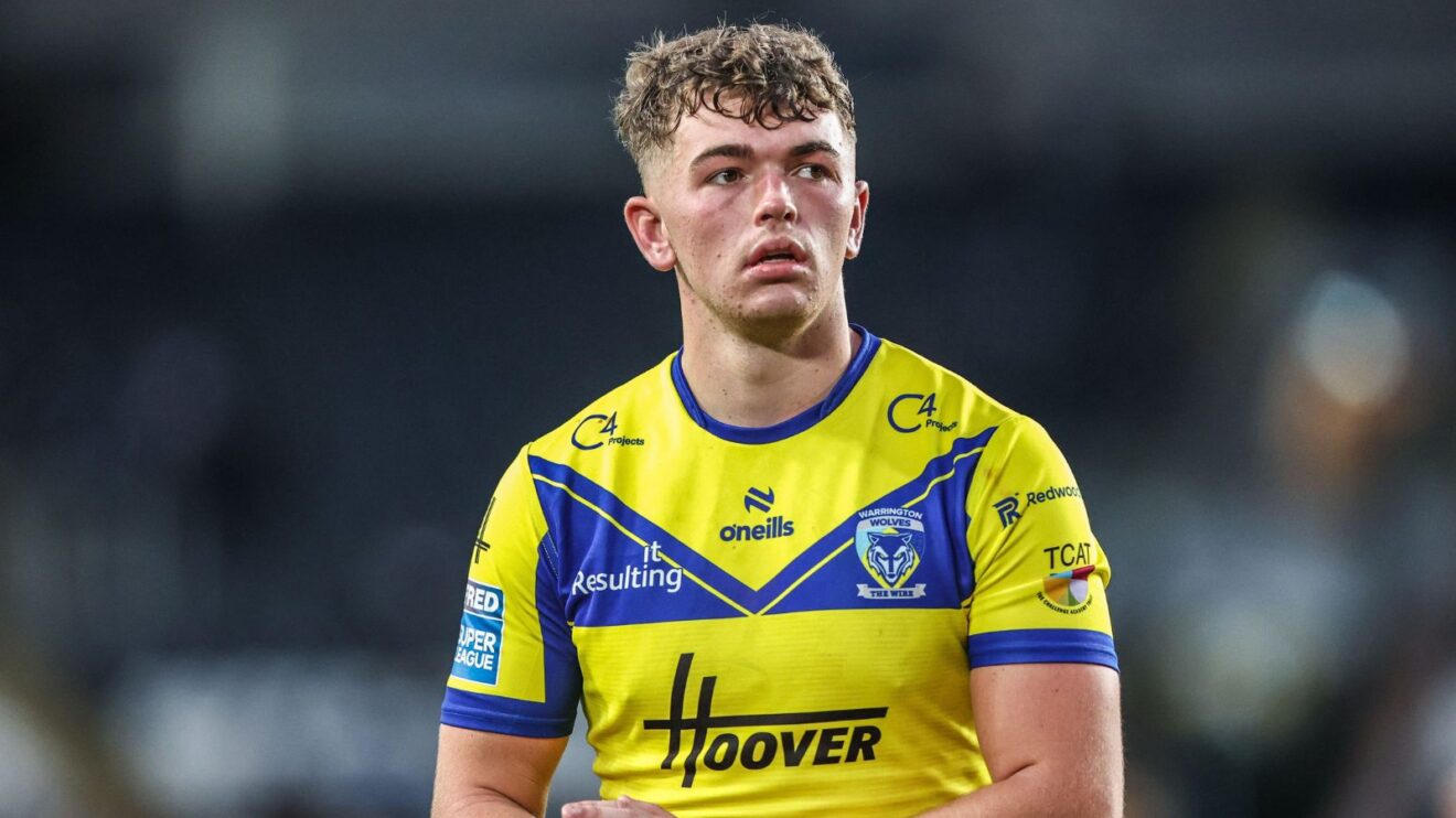 Tom McKinney applauds the Warrington Wolves supporters following a game in 2025