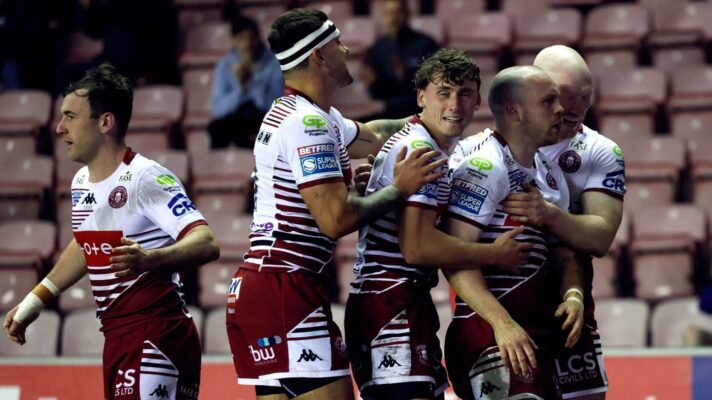 Wigan Warriors celebrate a try in 2026