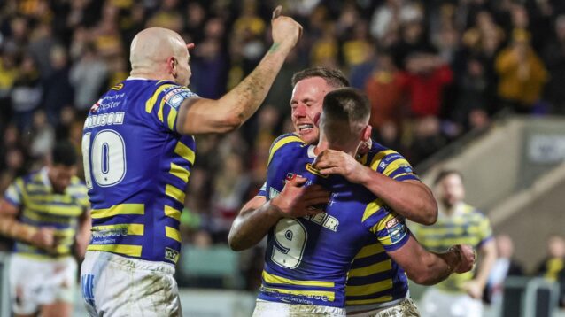 Warrington Wolves celebrate a try in 2026