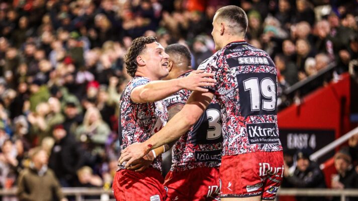 Leigh Leopards celebrate a try in 2026