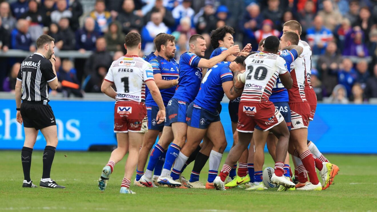 A scuffle unfolds during Wigan Warriors' Challenge Cup quarter-final victory at Wakefield Trinity in 2026