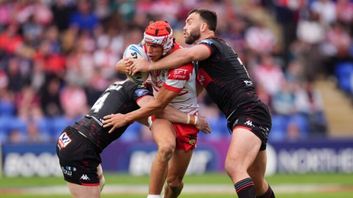 Harry Robertson carries the ball into contact v Wigan Warriors in 2026