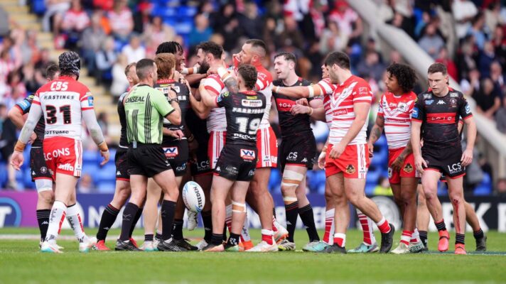St Helens' Alex Walmsley and Wigan Warriors' Junior Nsemba at the heart of a coming together between the two sides during their Challenge Cup semi-final tie in 2026