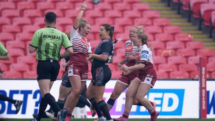 Wigan Warriors celebrate a try during their Women's Challenge Cup final triumph over St Helens in 2026