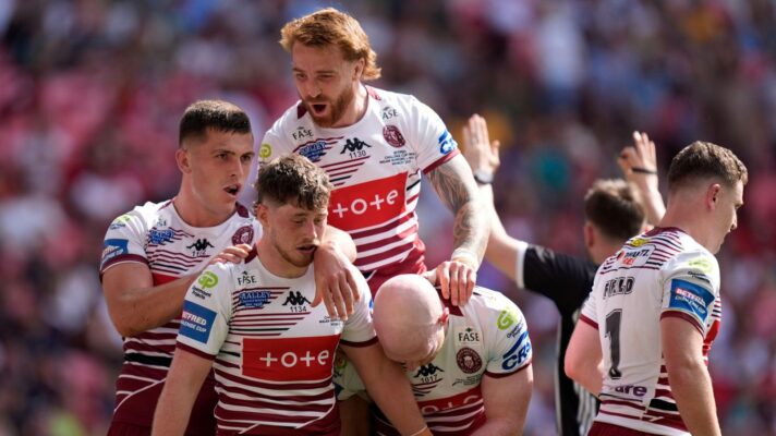 Wigan Warriors celebrate a try in the 2026 Challenge Cup final against Hull KR