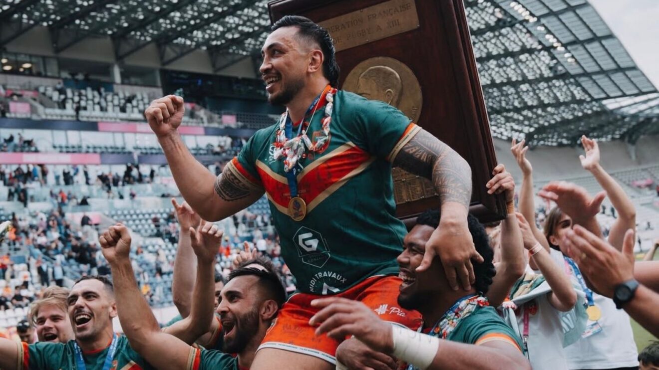 Harrison Hansen is held aloft by his Pia team-mates following their triumph in the 2026 Super XIII Grand Final