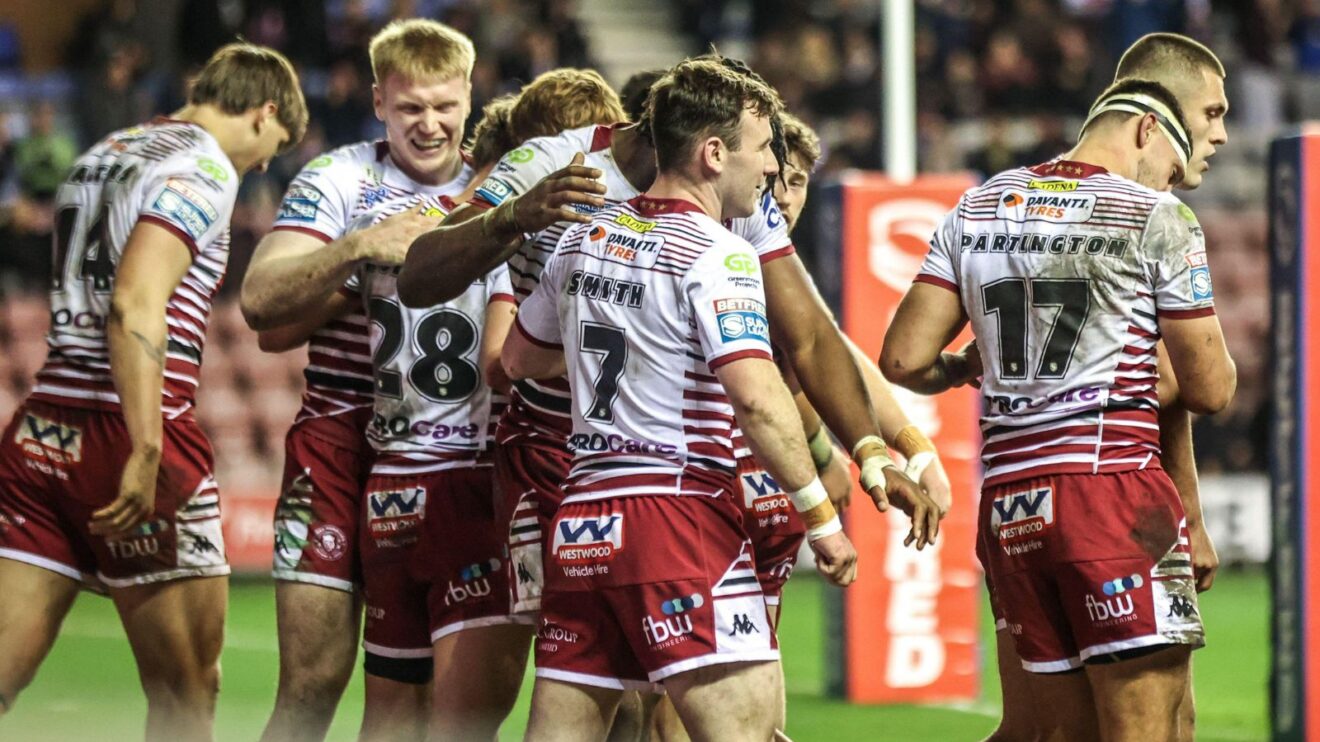 Wigan Warriors celebrate a try in 2026