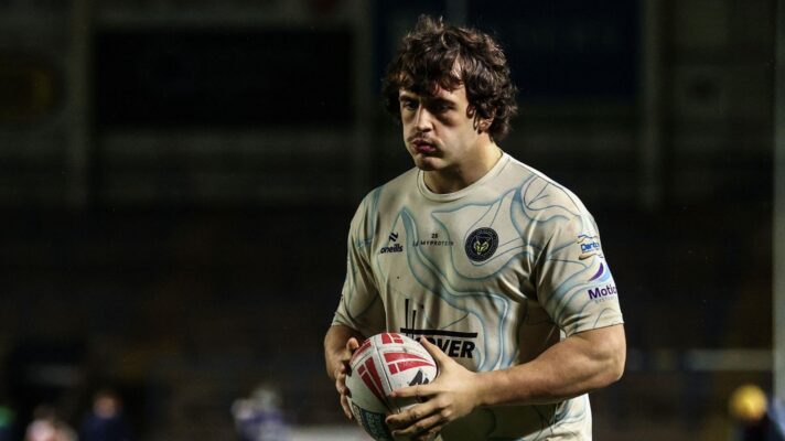 Max Wood warms up ahead of a Warrington Wolves game in 2026