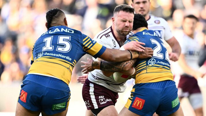 Nathan Brown in action for Manly Sea Eagles in 2026, carrying the ball in to two Parramatta Eels defenders