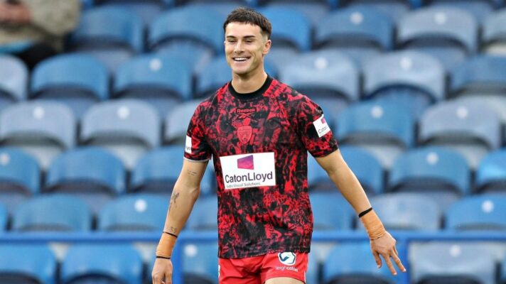 David Armstrong warms up ahead of a Leigh Leopards game in 2025