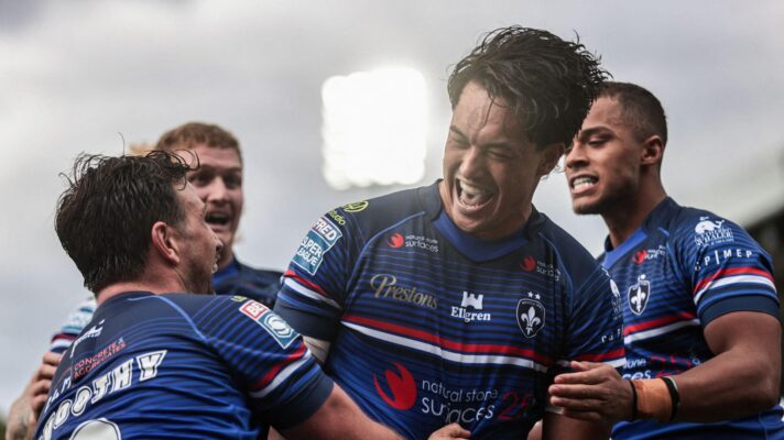 Isaiah Vagana celebrates after scoring during the BetFred Super League match between Wakefield Trinity and Warrington Wolves.