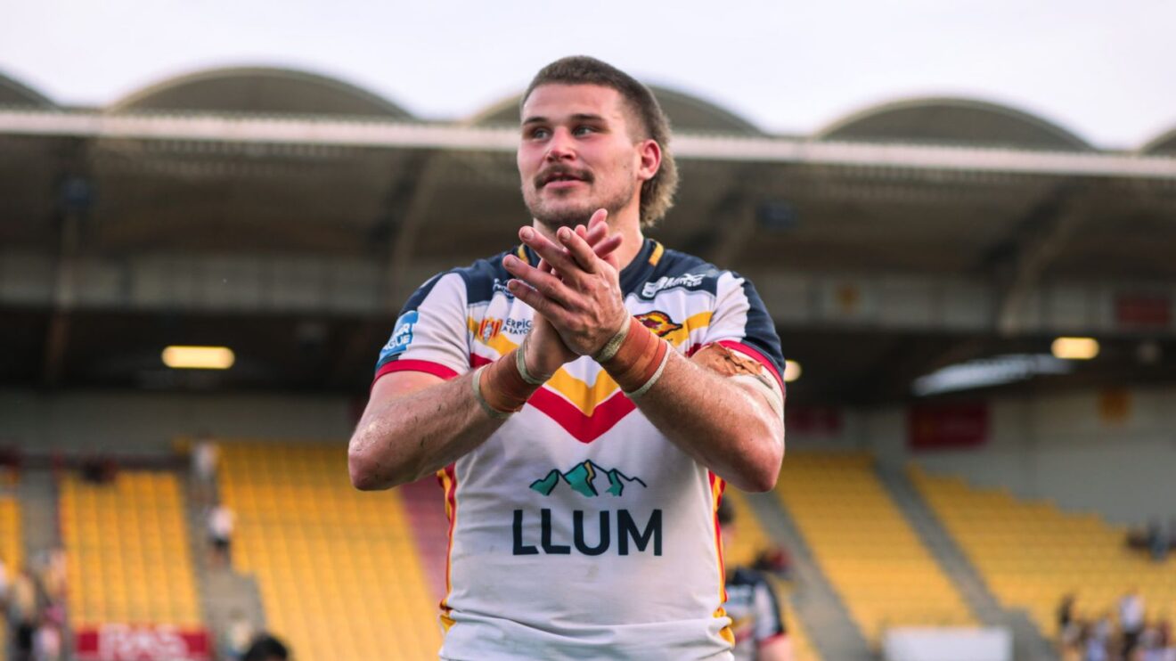 Josh Allen applauds Catalans Dragons supporters following a game in 2026