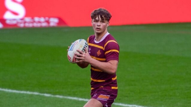 Huddersfield young gun and budding match official seals permanent Championship switch
