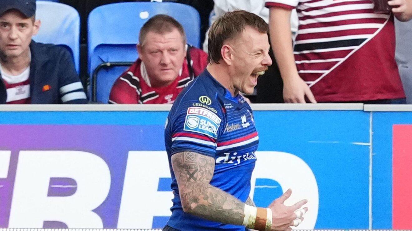 Tom Johnstone celebrates a try in Wakefield Trinity's play-off semi-final win at Wigan Warriors in 2026