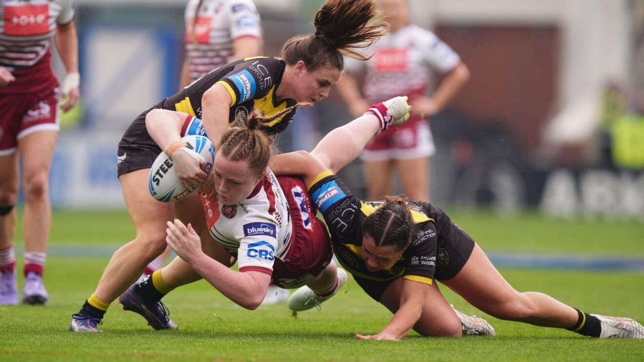 An action shot from a clash between Wigan Warriors and York Valkyrie in 2026